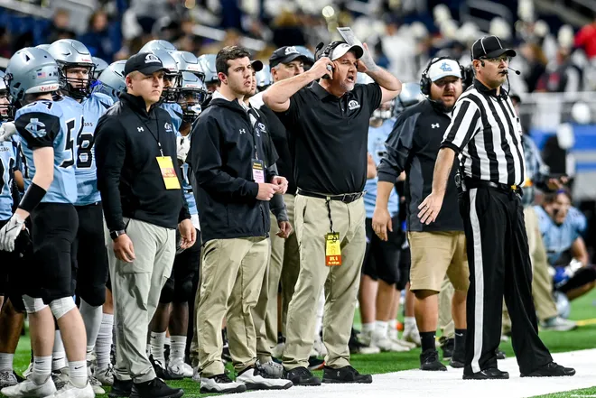 Lansing Catholic Coaches on the sideline of the 2021 State Championship Game